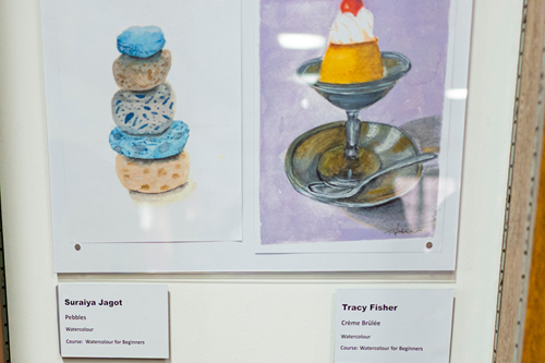 Suraiya's artwork, watercolour pebbles, in gallery